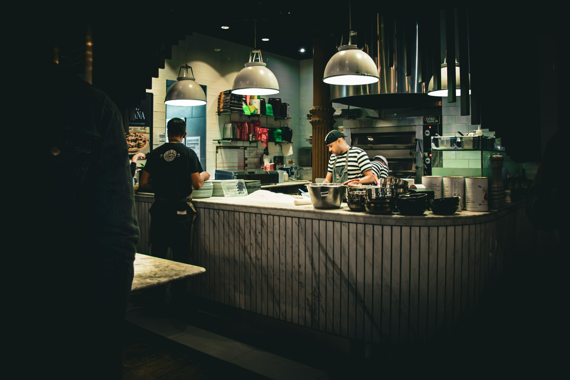 A dark restaurant kitchen